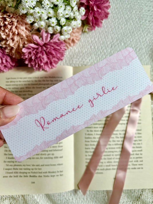 A bookmark with the text Romance Girlie