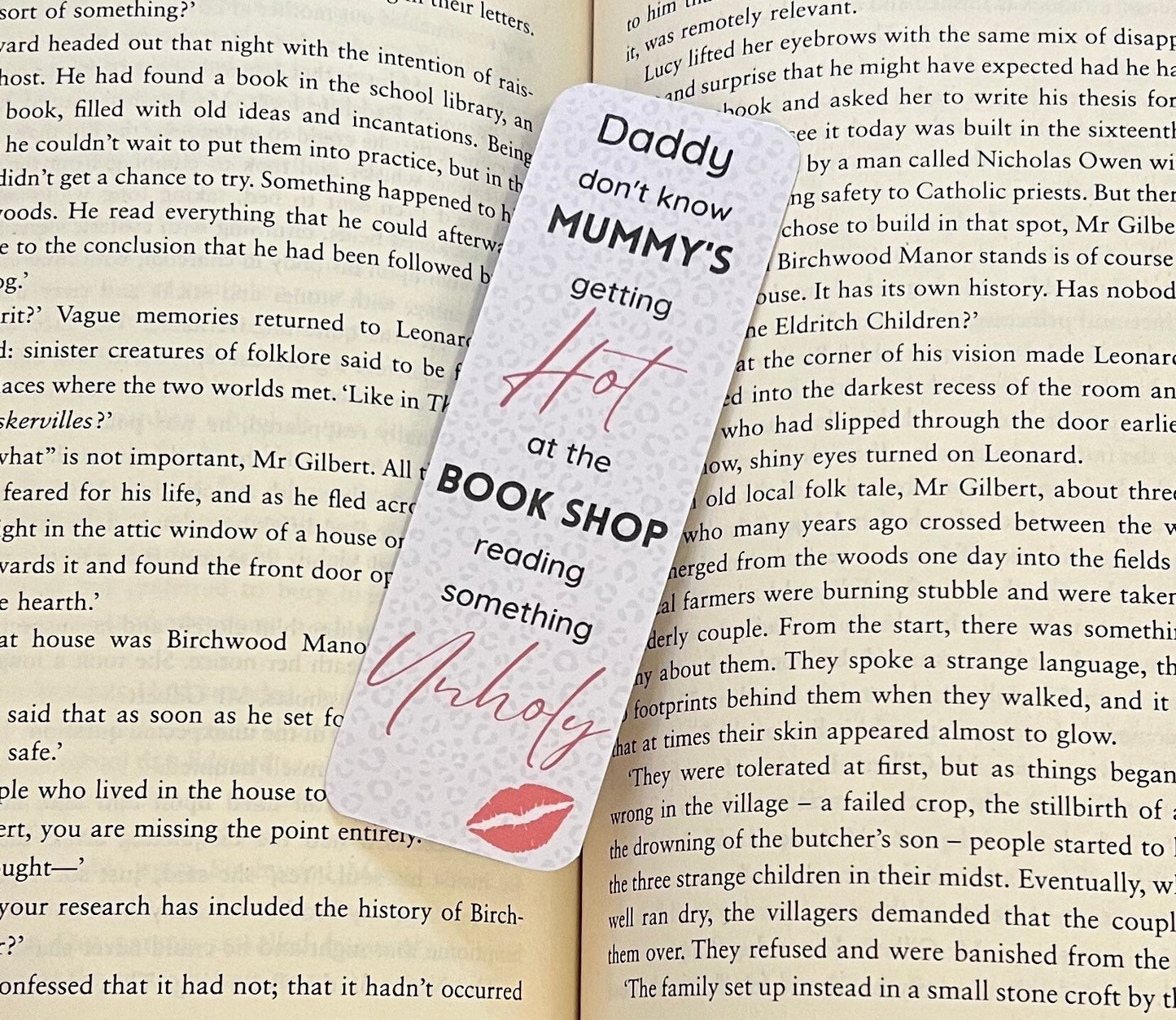 Daddy don’t know Mummy’s getting hot at the bookshop reading something unholy Bookmark