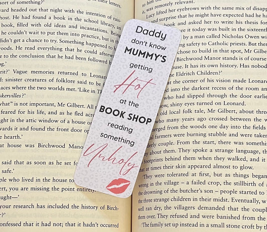Daddy don’t know Mummy’s getting hot at the bookshop reading something unholy Bookmark